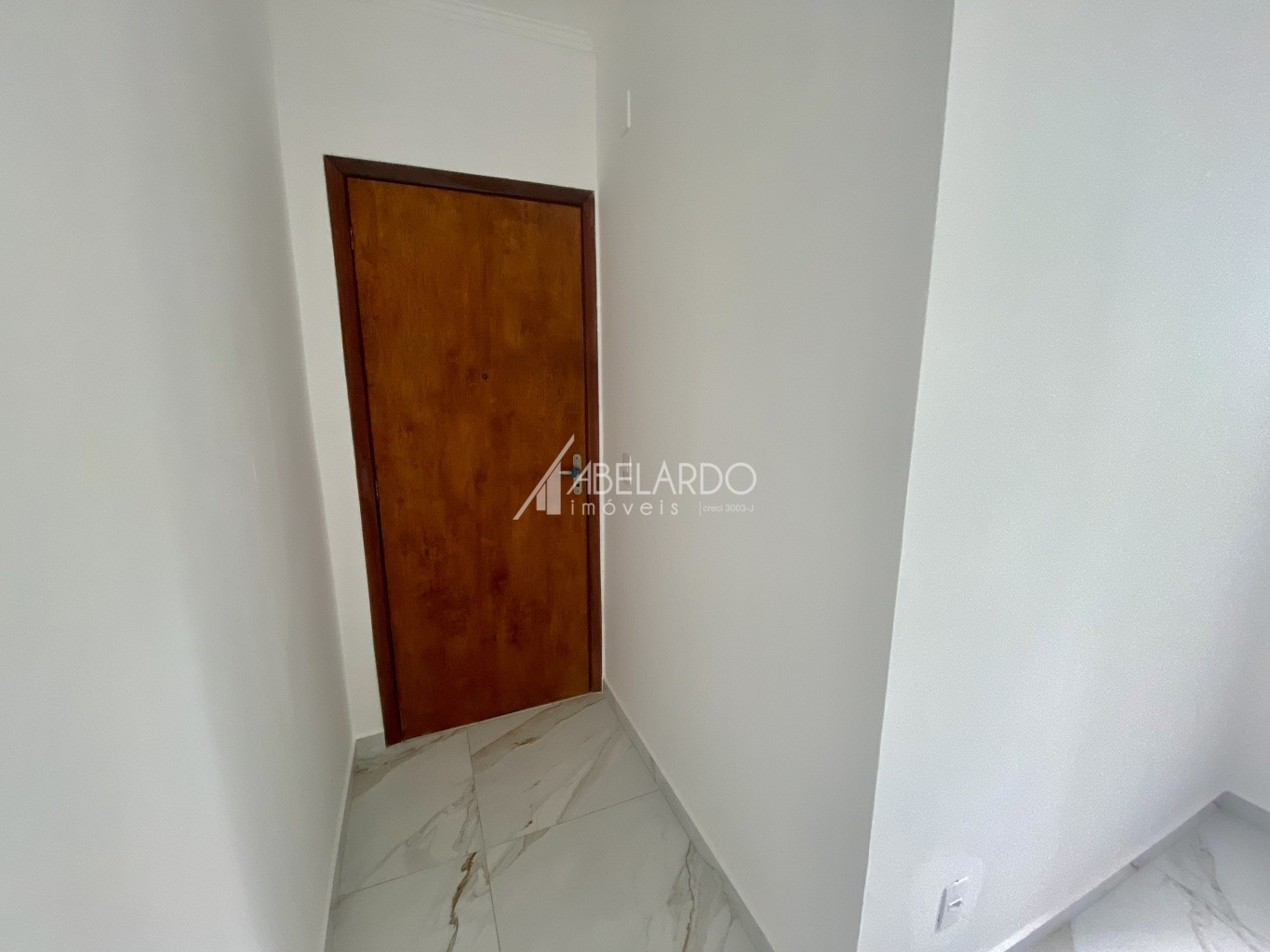 Apartamento com dois dormitórios, um banheiro e uma garagem. — foto 4