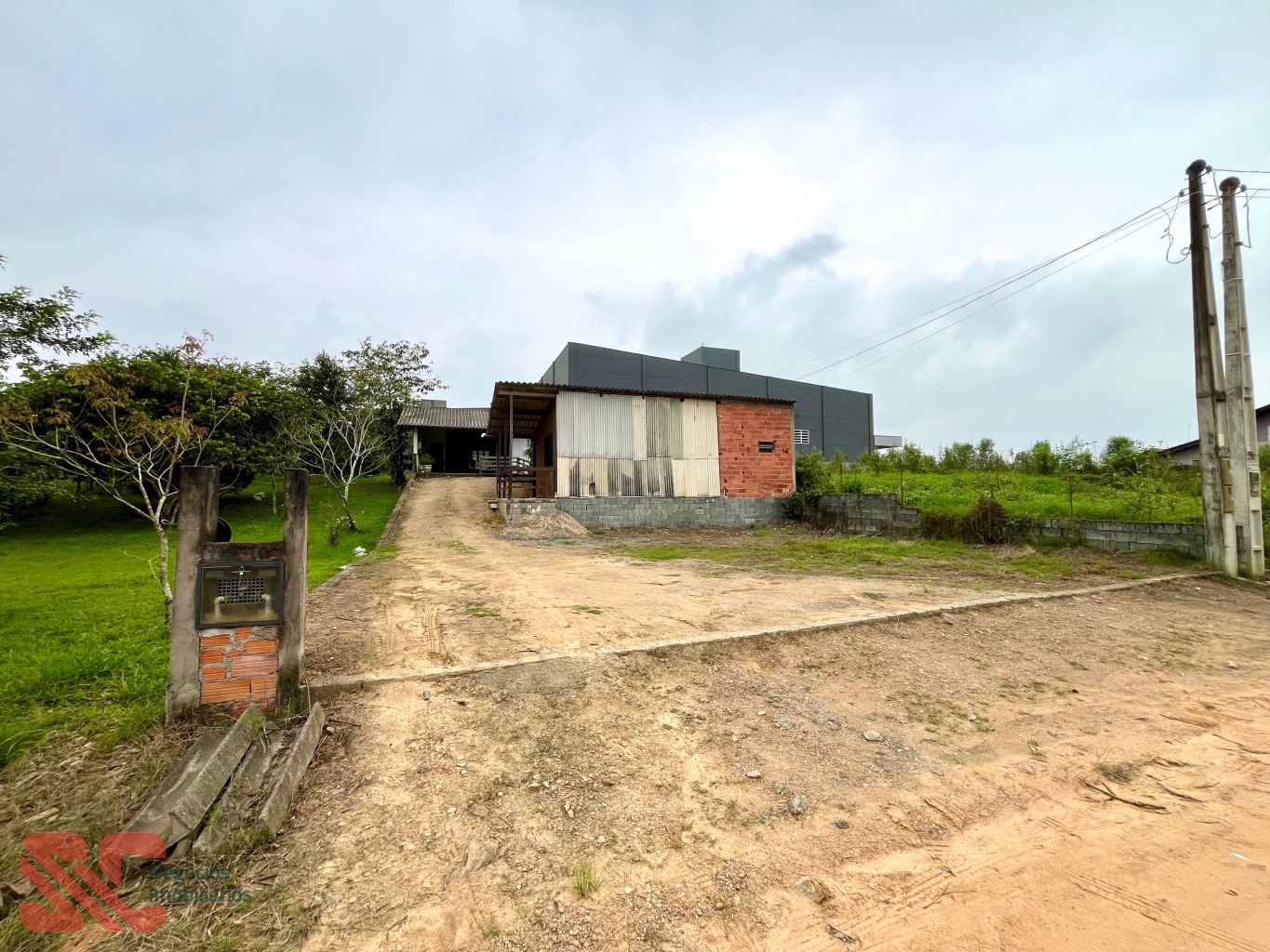 Terreno com duas casas no bairro estradinha — foto 2