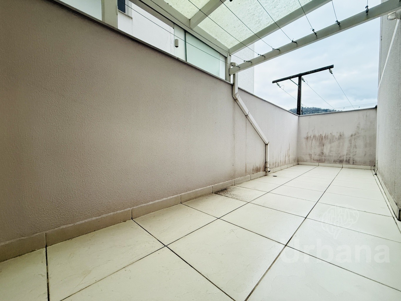 Apartamento com terraço no Centro | Urbana Imóveis