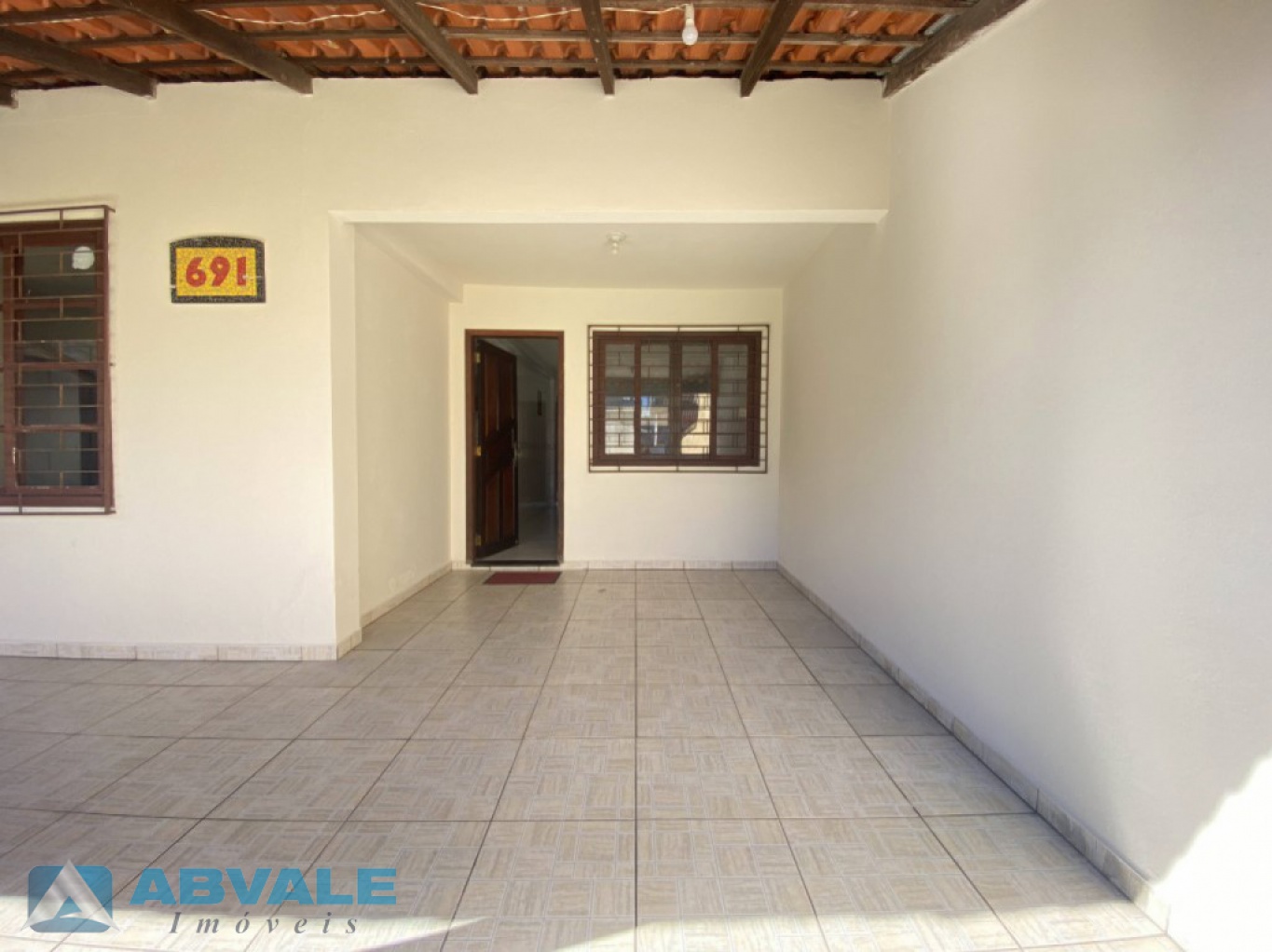 Casa de Alvenaria em Perequê, com 4 dormitórios e Garagem — foto 3