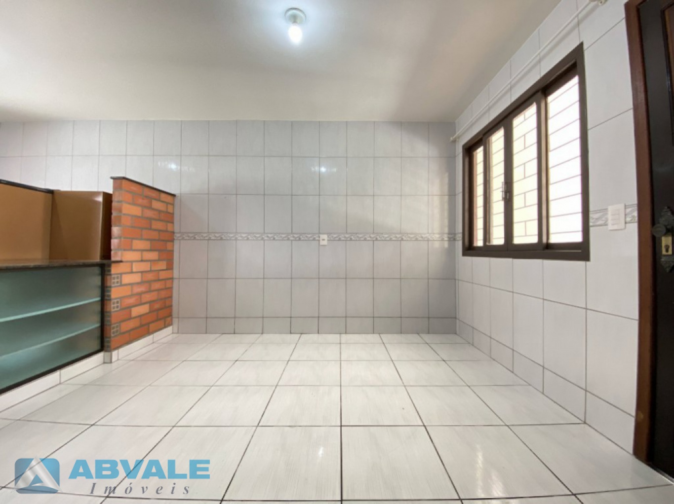 Casa de Alvenaria em Perequê, com 4 dormitórios e Garagem — foto 4