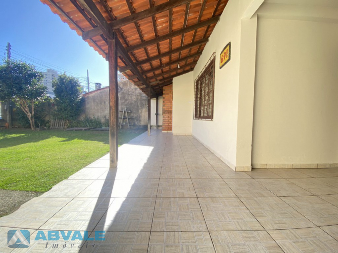 Casa de Alvenaria em Perequê, com 4 dormitórios e Garagem — foto 2